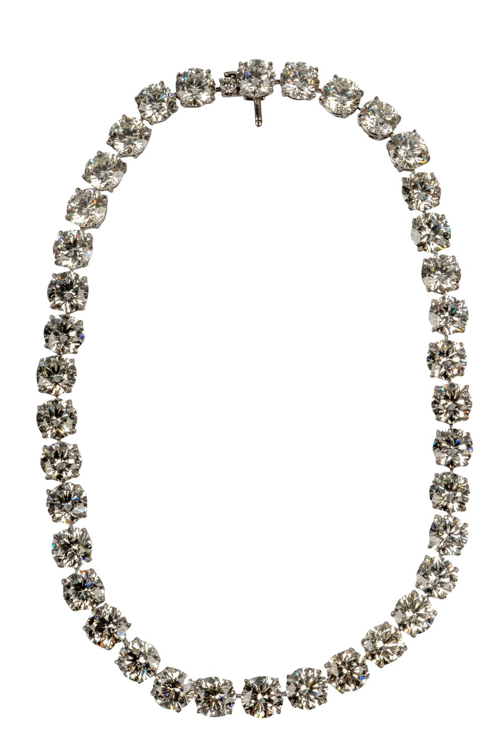 Appraisal: PLATINUM DIAMOND RIVIERE NECKLACEcontaining round brilliant cut diamonds I-J VS