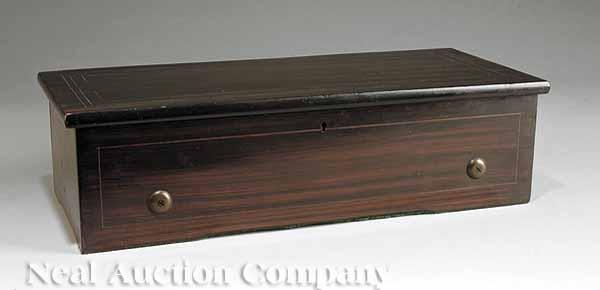 Appraisal: An Antique Swiss Twelve Aire Cylinder Music Box c ebonized