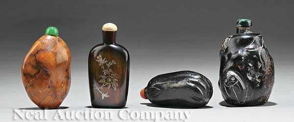 Appraisal: A Group of Four Chinese Snuff Bottles the first amber