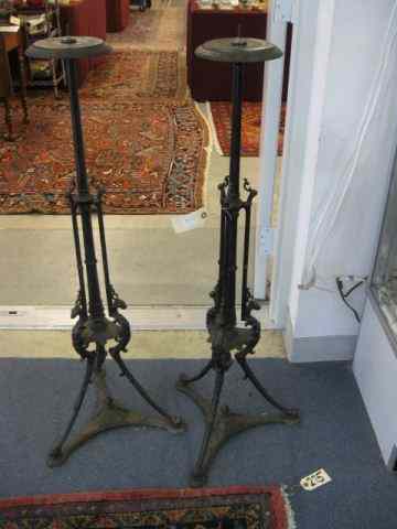 Appraisal: Pair of Victorian Iron Candlestands '' tall tri-footed