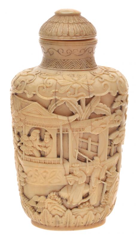 Appraisal: A RELIEF CARVED IVORY SNUFF BOTTLE TH CENTURY