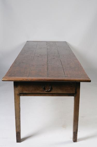 Appraisal: A TH CENTURY FRENCH CHERRY WOOD DINING TABLE with a