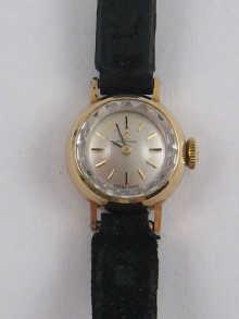 Appraisal: A ct gold Omega ladies watch with silvered dial circa