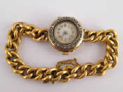 Appraisal: A yellow metal tests carat gold lady's bracelet watch with