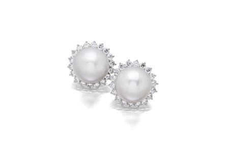 Appraisal: A pair of South Sea cultured pearl and diamond earrings