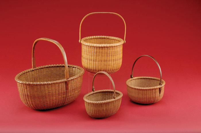 Appraisal: LARGE OVAL NANTUCKET BASKET WITH STATIONARY HANDLE Height inches length