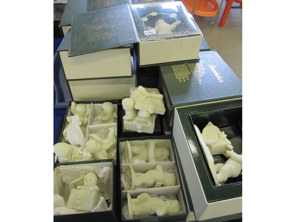 Appraisal: Lot comprising two trays of Dept snowbabies figures in boxes