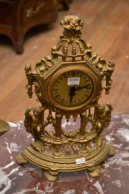 Appraisal: A BRASS QUARTZ CLOCK