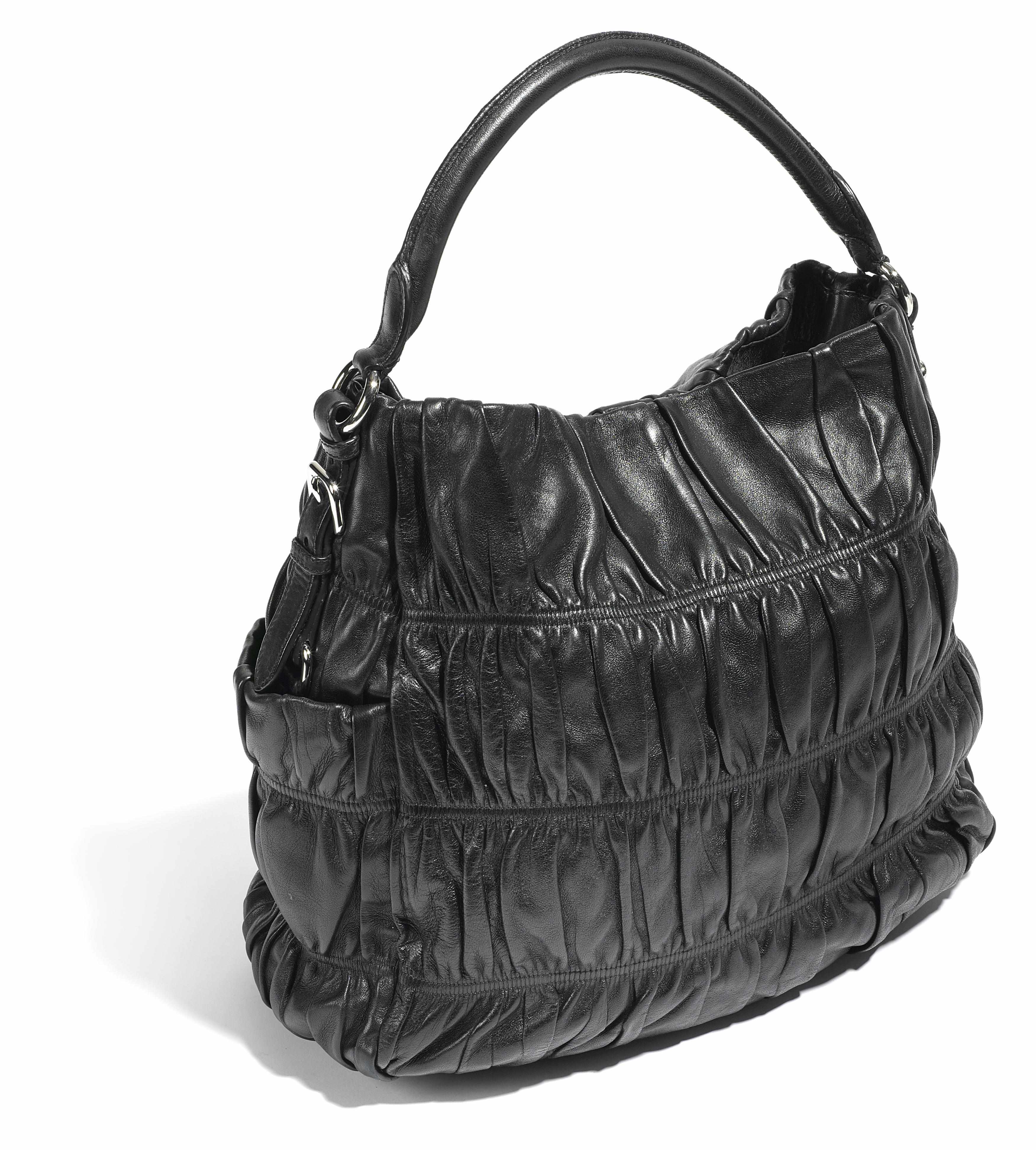 Appraisal: A Prada black ruched leather handbag x x in