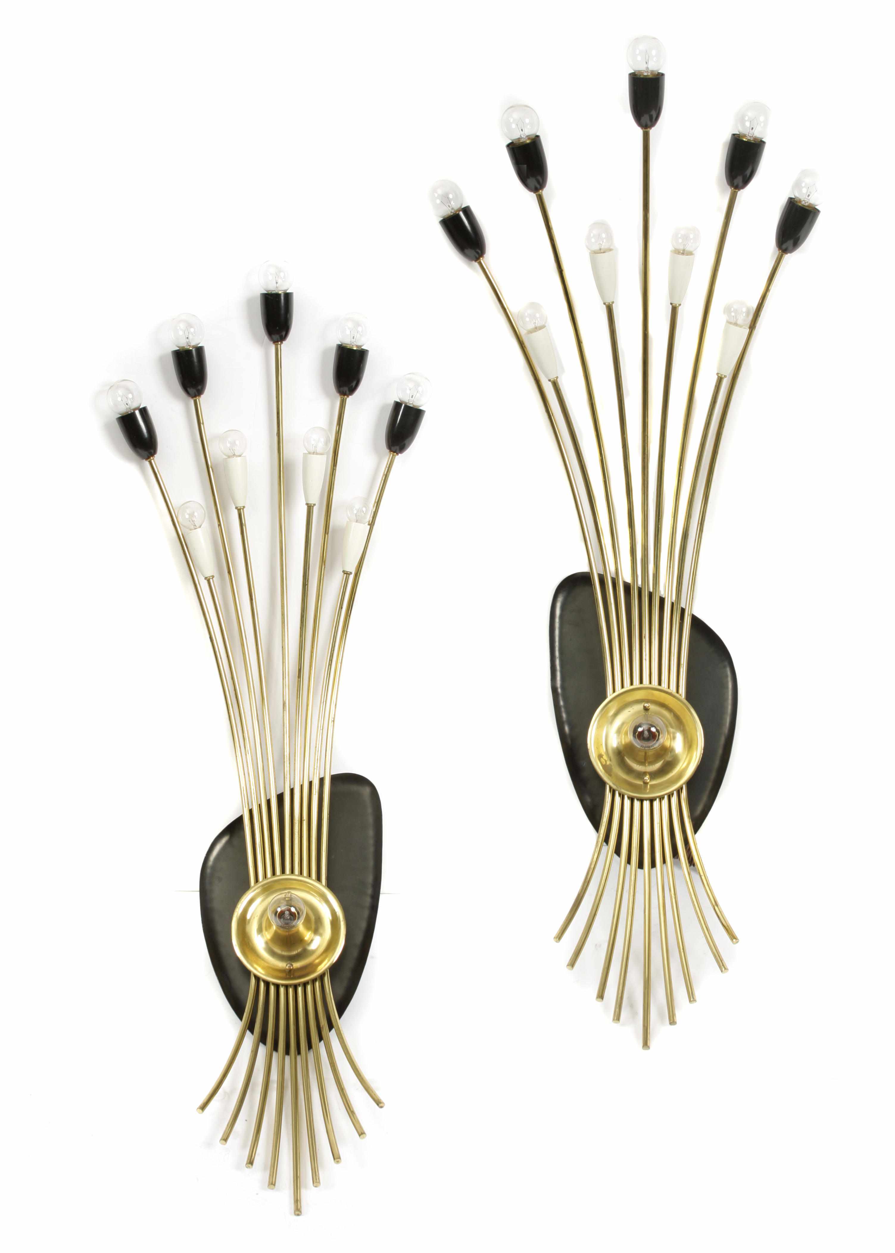 Appraisal: A pair of Italian brass sconces approximate length in approximately