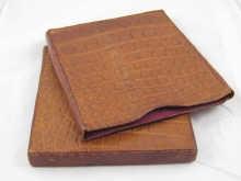 Appraisal: Two crocodile skin ledger covers x cm