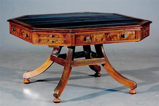 Appraisal: Victorian walnut and leather-topped drum table late th century octagonal