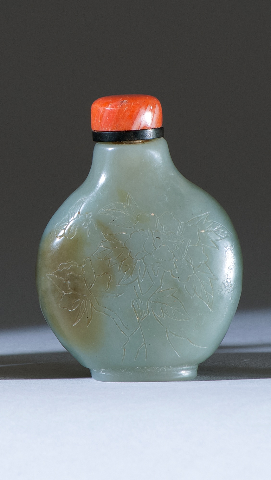 Appraisal: GREEN JADE SNUFF BOTTLE Circa In pear shape with peony