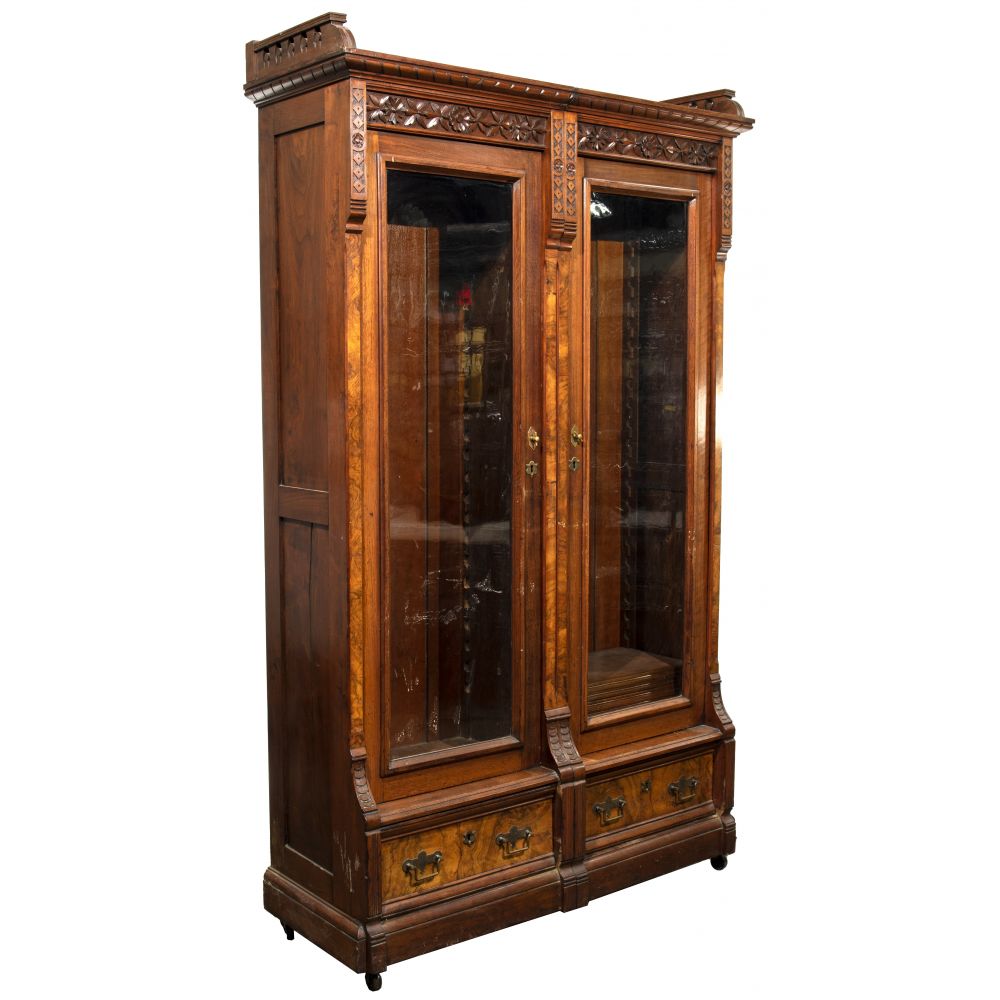 Appraisal: AMERICAN EASTLAKE MAHOGANY DISPLAY CABINETConsisting of joined cabinets each having