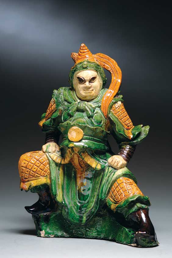 Appraisal: MING SANCAI GLAZED WARRIOR Well modeled Chinese Ming Dynasty sancai