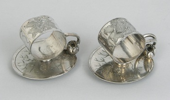 Appraisal: A Pair of Victorian Silver Plate Figural Napkin Rings A