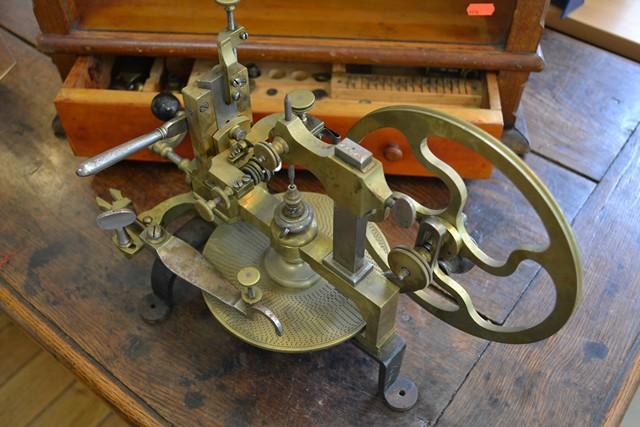 Appraisal: TH CENTURY WATCH MAKERS GEAR CUTTING MACHINE HOUSED IN DISPLAY