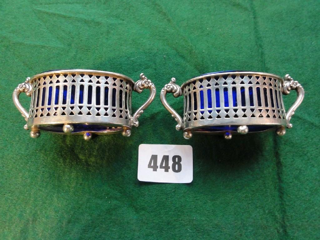 Appraisal: A pair of Georgian style silver salts of oval form