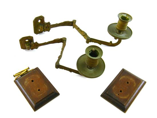 Appraisal: Pair of bronze candle sconces movable arm with three joints