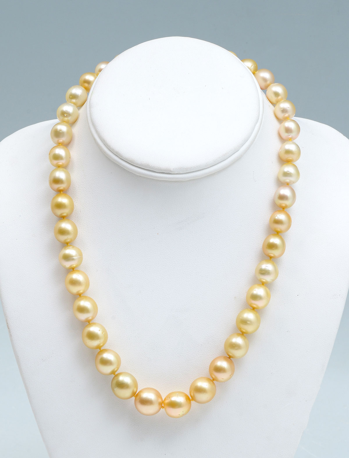 Appraisal: GOLDEN SOUTH SEA PEARL NECKLACE off round golden South Sea