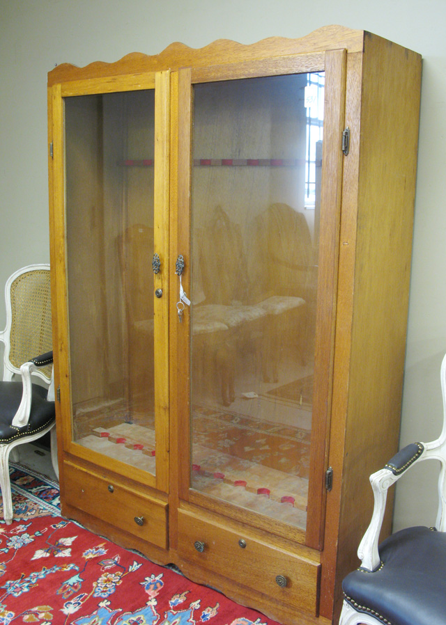 Appraisal: DOUBLE-DOOR GUN CABINET American mid- th century accommodating up to