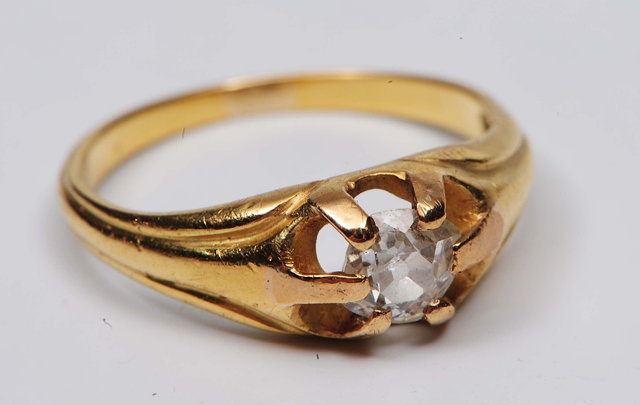 Appraisal: An ct marks rubbed gold ringwith solitaire diamond setting