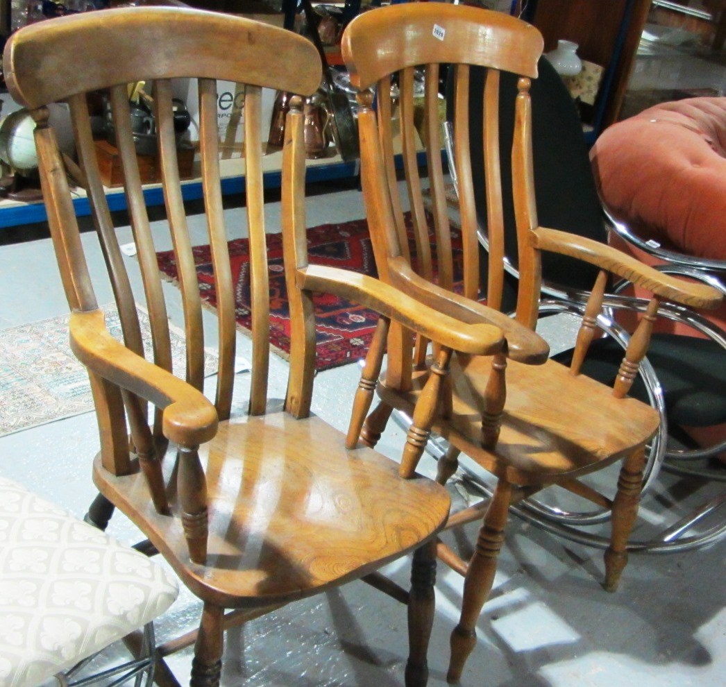 Appraisal: A group of three stick back open armchairs