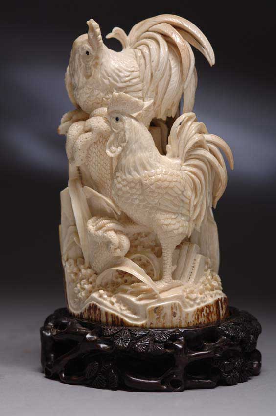 Appraisal: FINE FOSSIL IVORY CARVING Exquisitely detailed carved fossil mammoth ivory