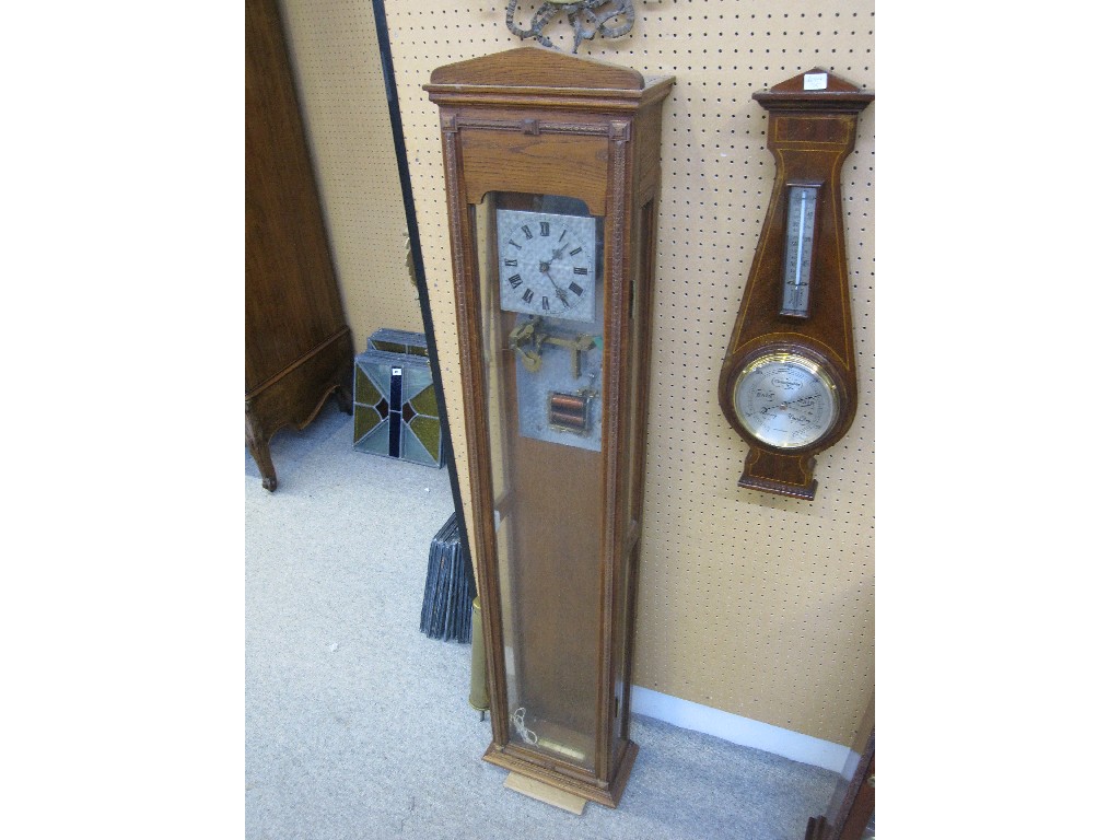 Appraisal: Oak cased electric clock