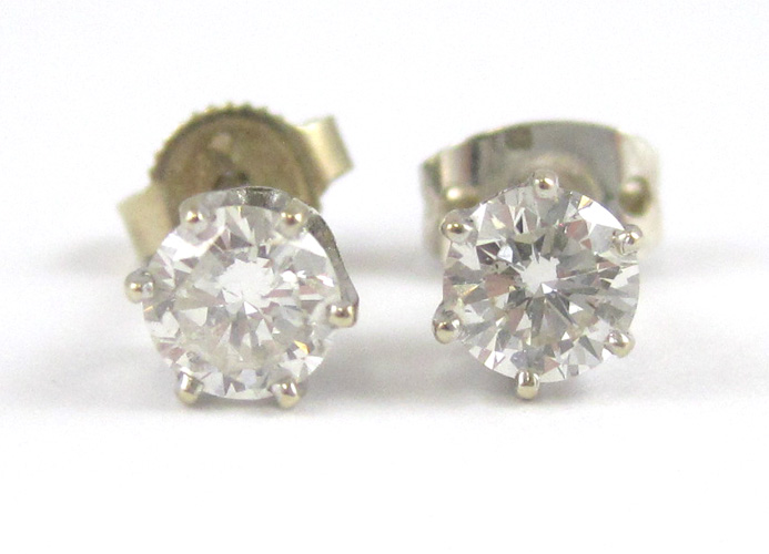 Appraisal: PAIR OF DIAMOND AND WHITE GOLD EAR STUDS each k