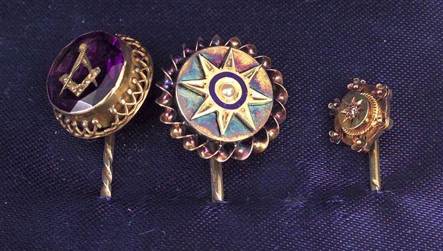 Appraisal: GOLD MASONIC STICK PIN set with a stone of amethyst