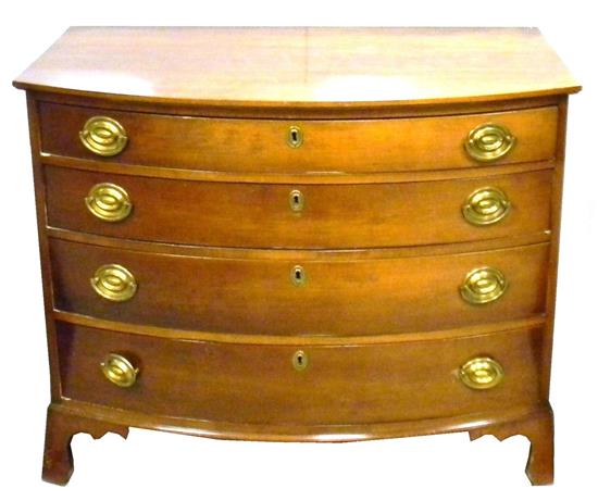 Appraisal: Bow front chest American th C cherry graduated drawers straight