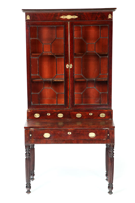 Appraisal: SHERATON DESK-AND-BOOKCASE American early th century mahogany poplar and pine