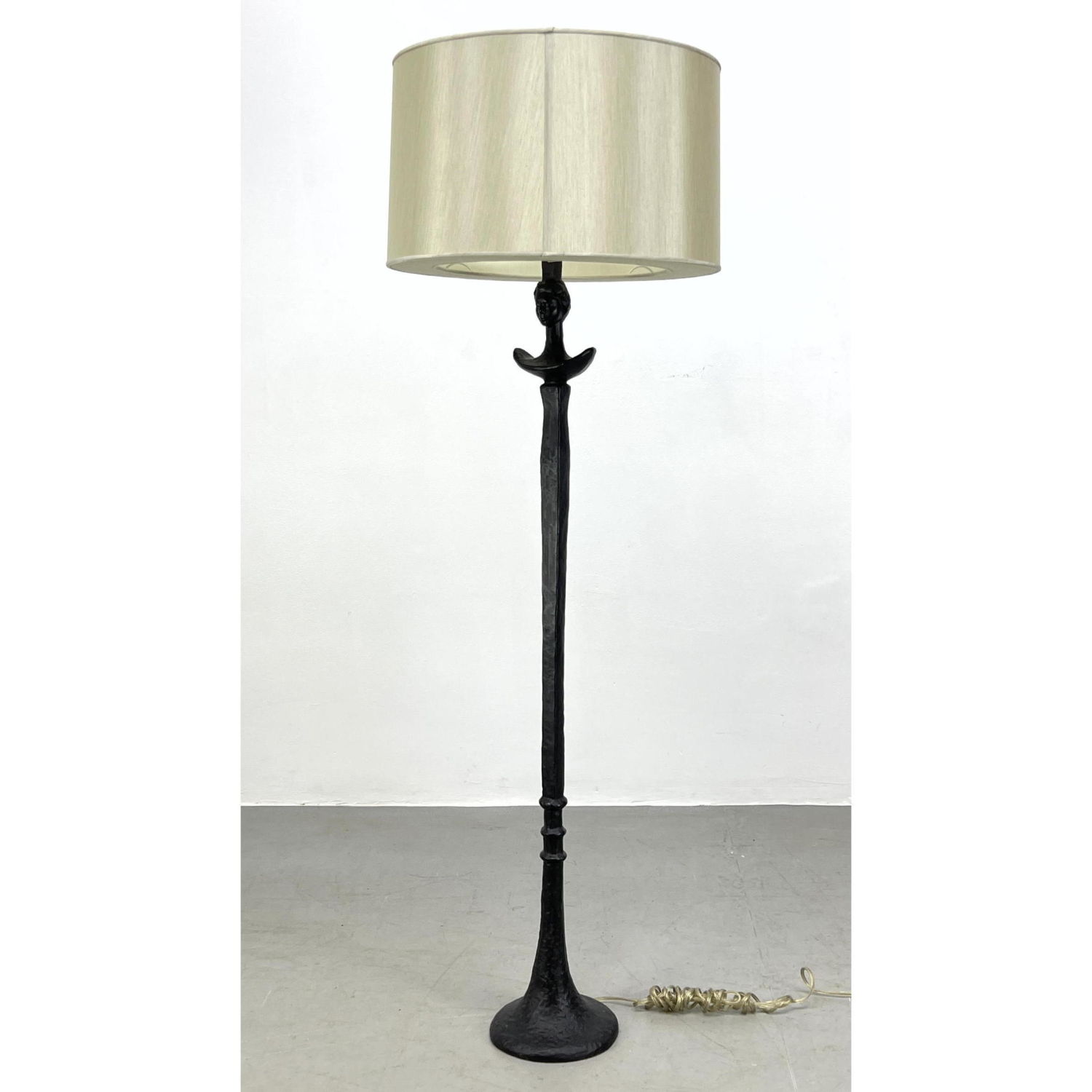 Appraisal: Giacometti style Cast Iron Figural Floor Lamps Tete de Femme