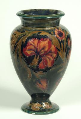 Appraisal: A MOORCROFT POTTERY VASE of ovoid form with flared rim