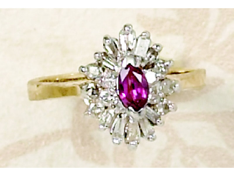 Appraisal: DIAMOND AND RUBY RING k yellow gold ring set with