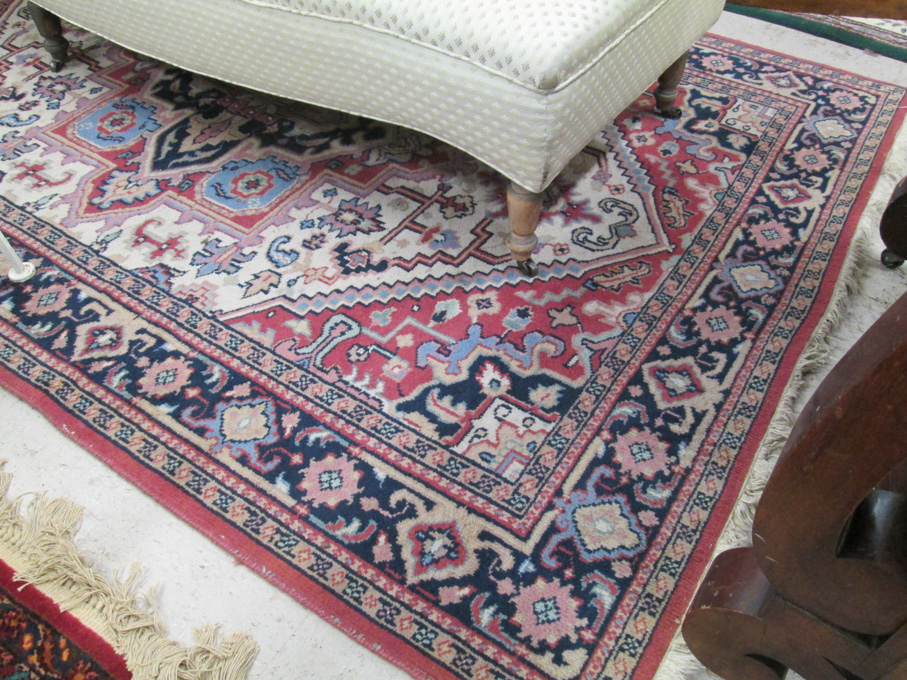 Appraisal: HAND KNOTTED ORIENTAL CARPET Indo-Heriz ' x '