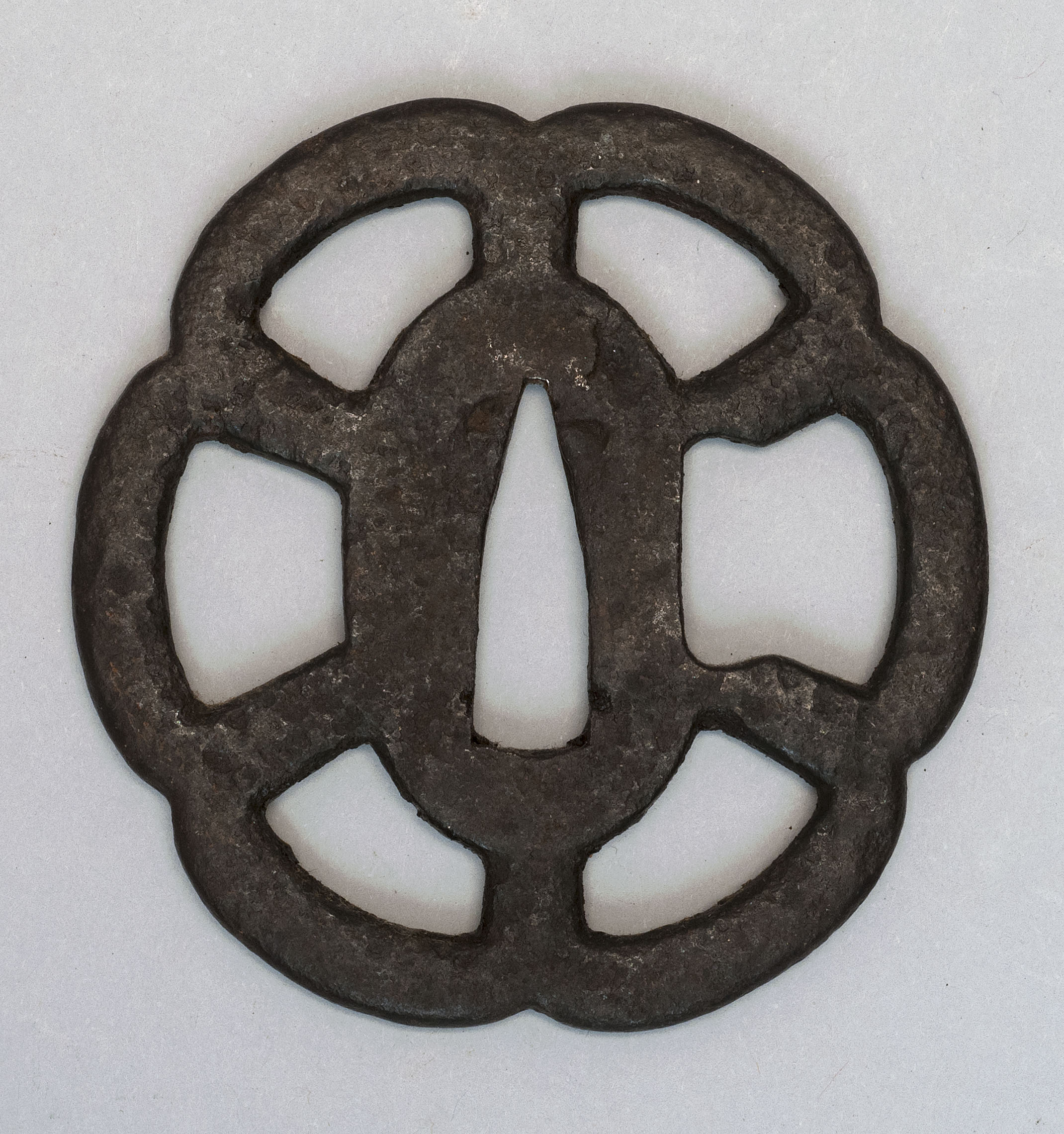 Appraisal: SIX-LOBED IRON TSUBA th CenturyWith openwork design Length cm ConditionSome