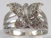 Appraisal: A white metal tests carat gold diamond set butterfly ring