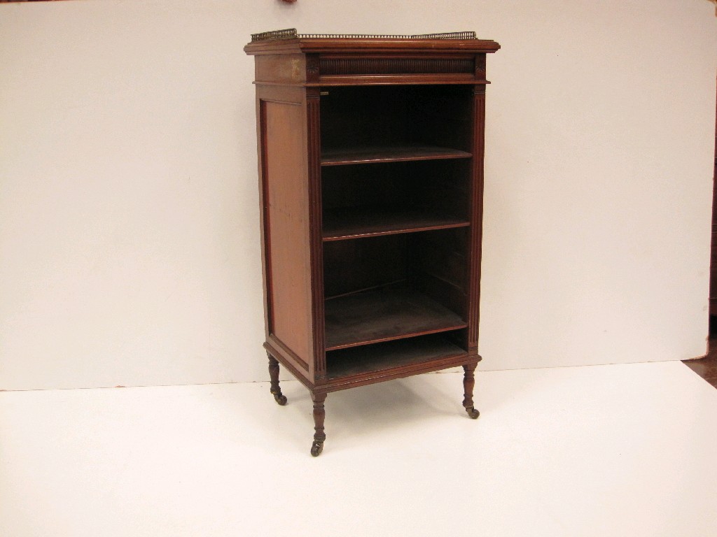 Appraisal: A Victorian walnut Folio Cabinet with brass gallery above open