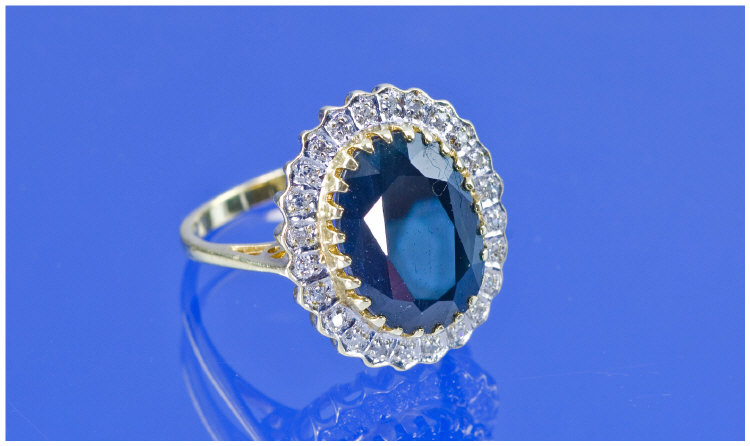 Appraisal: ct Gold Diamond And Sapphire Cluster Ring Central Large Oval