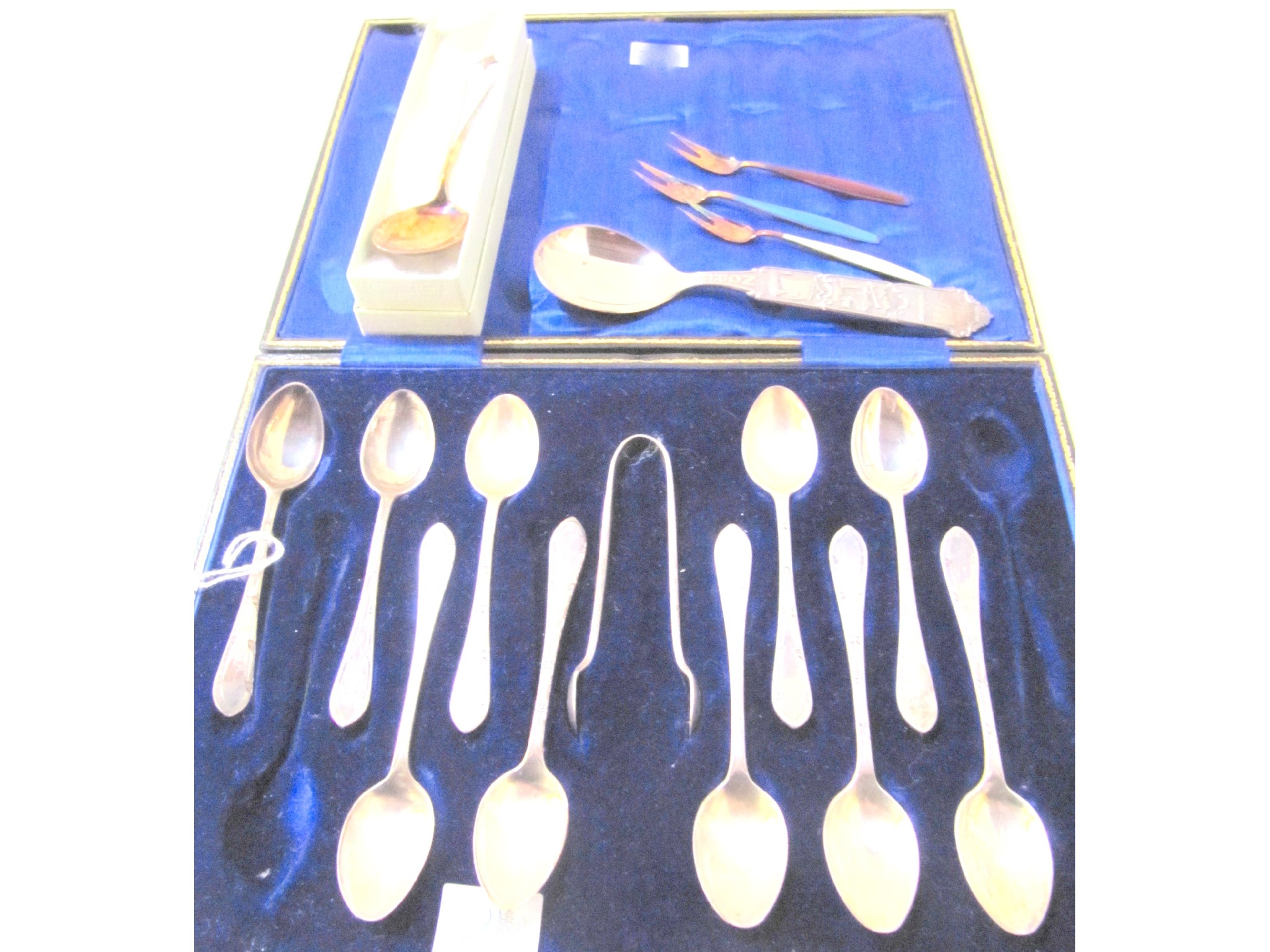 Appraisal: A lot comprising a part set of silver spoons with