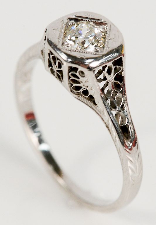 Appraisal: karat white gold filigree ring set with center diamond cts