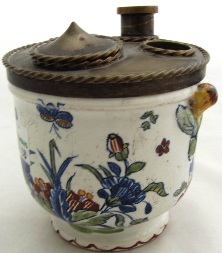 Appraisal: A French faience inkwell with gilt-metal fittings circa the sides