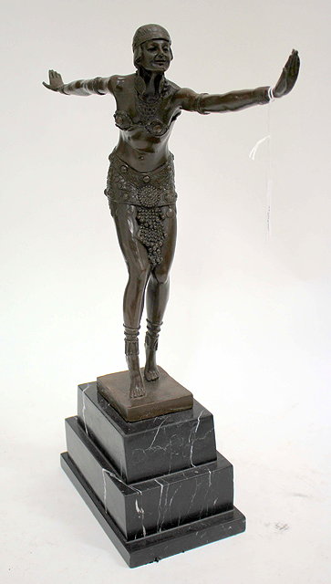 Appraisal: A CONTEMPORARY BRONZE SCULPTURE of a dancing girl on a