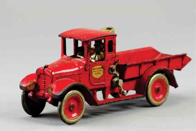 Appraisal: ARCADE IH RED DUMP TRUCK Cast iron painted in familiar