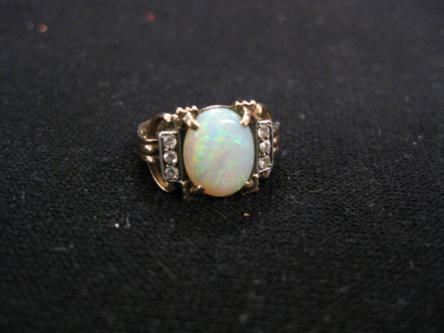 Appraisal: Opal Diamond Ring oval cabachon gem diamonds on each side