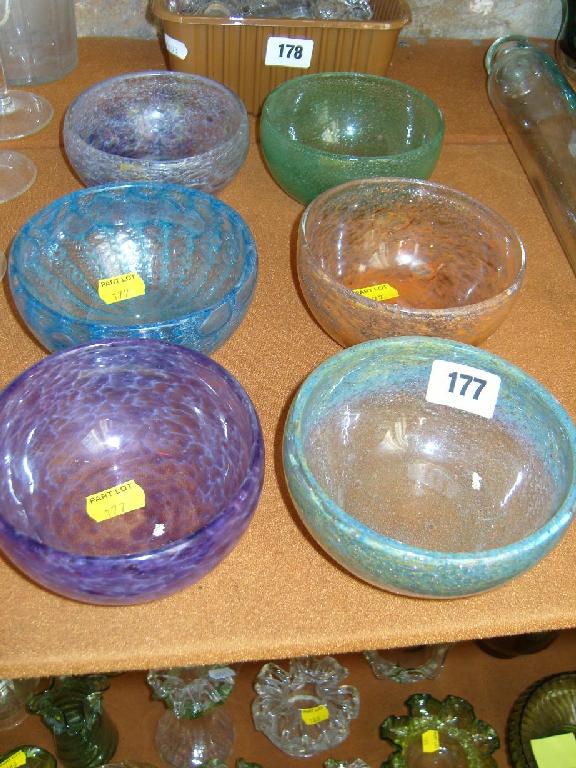 Appraisal: A set of six coloured glass bowls with various decorative