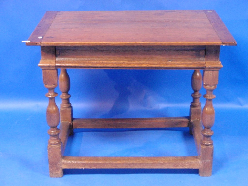 Appraisal: A thC oak centre table the rectangular top with colleeted