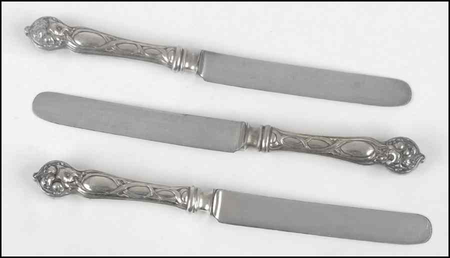 Appraisal: SET OF TWELVE STERLING SILVER KNIVES Sterling handles are in